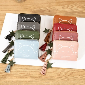 Short zipper wallets for women featuring cute cartoon cat prints and colorful tassels