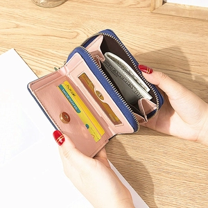 Mini navy and pink short leather wallet with multiple card slots and gold zipper