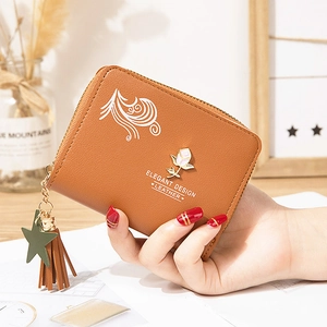 Brown leather short wallet with rose metal ornament and elegant floral pattern