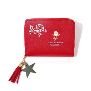 Elegant red faux leather mini wallet with rose hardware, tassel, and star pendant