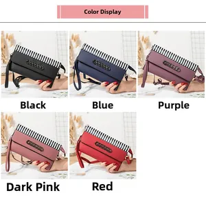 Detail view of colorful textured leather crossbody bags with black and white stripe accents