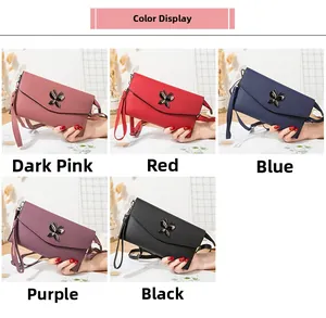 Close-up of butterfly hardware buckles on leather shoulder bags in five different colors
