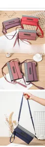 Detail view of colorful striped crossbody bags with metal ring buckle and detachable straps