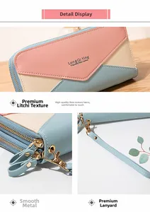 Detailed view of tricolor lychee grain texture with smooth metal zipper and wrist strap