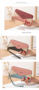 Three-tiered display of long PU leather zip-around clutch wallets with color-block design