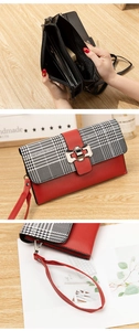 Detailed interior of red houndstooth wallet with card slots and metal bow clasp