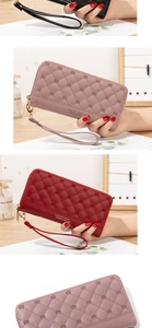 Close-up of quilted PU leather long wallets with crown embroidery and wrist straps