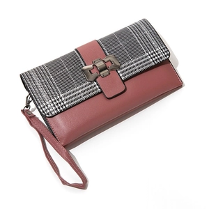 Pink leather long wallet with houndstooth pattern and metal buckle on white background