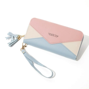 Women long zipper wallet with patchwork design, tassels and wrist strap on white back