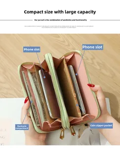 Internal structure of green long wallet featuring dual phone slots and striped lining