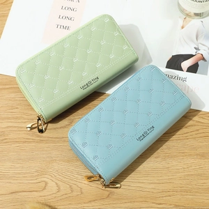Diamond quilted long phone wallet for women featuring double zippers and crown embroidery