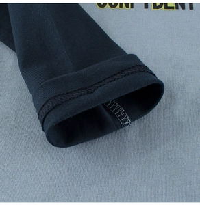 Detail of reinforced cuffs and precise stitching on kids long sleeve sweatshirt