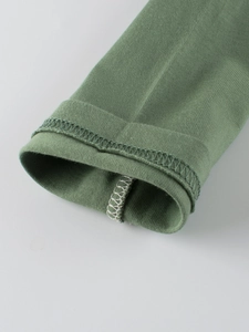 Sage green long sleeve cotton T-shirt featuring high-quality white overlock cuff stitching