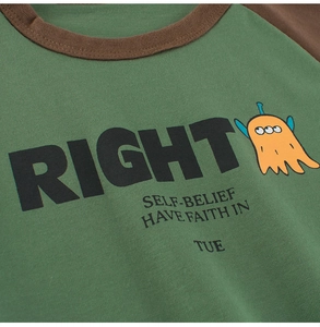Detail view of cotton raglan sleeve T-shirt with monster print and slogan