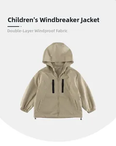 Detail of khaki kids windbreaker featuring double-layer windproof fabric and zipper