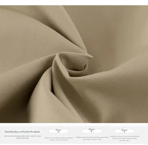 Close-up of khaki twill cotton fabric texture showing quality safety standards and material