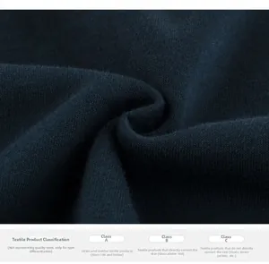 Detail of soft fleece fabric showing safety standards for kids' winter sweatshirts