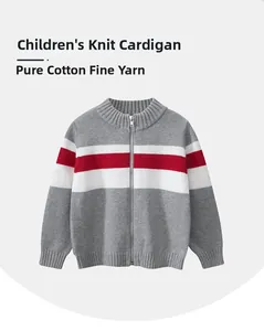 Detail of children's grey knit cardigan with red stripes and pure cotton texture