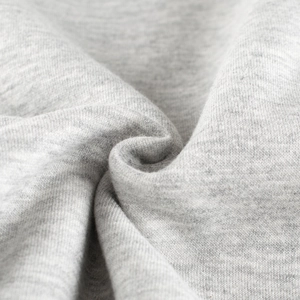 Detailed macro view of soft heather grey fleece fabric texture for kids' hoodies