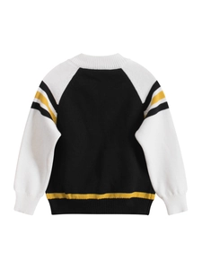 Kids black and white color block knit sweater with yellow stripes and raglan sleeves