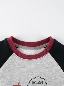 Kids warm fleece sweatshirt with red collar, grey body, and black raglan sleeves