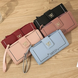 Cartera larga para mujer con hebilla de mariposa dorada y correa de muñeca elegante
