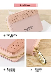Détails d'un portefeuille en similicuir rose avec perforations laser et zip en métal
