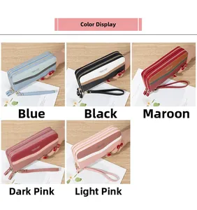 Close-up of long zip-around wallets in five colors featuring lychee grain and hand straps
