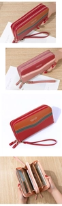 Detail of multi-compartment interior for long bifold wallet with pebble leather texture