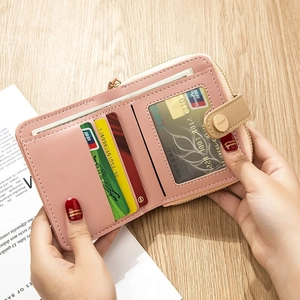 Portefeuille femme rose en similicuir à deux volets avec détails plume et porte-cartes