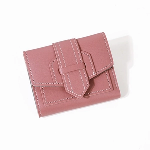 Petit portefeuille rose minimaliste en similicuir avec coutures blanches et boucle