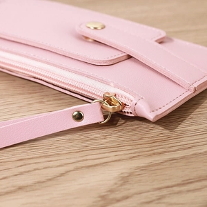 Portefeuille long en similicuir rose pâle avec fermeture éclair et fentes pour cartes