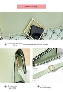 Detailed close-up of double-square golden buckle and vintage chain pattern on green bag