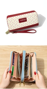 Dual-zipper long wallet with HR monogram print, showing spacious internal compartments