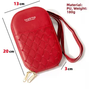 Detail showing dimensions 13x20x3cm and weight 180g of the red embroidered phone bag