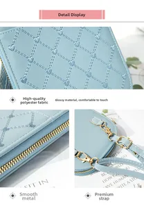 Detailed view of light blue quilted phone bag with heart stitching and gold metal zipper
