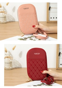 Detail of cross-body mobile phone bags with heart-shaped embroidery and dual zippers