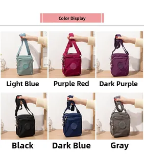 Color display of nylon crossbody phone bags in light blue, purple, black, and gray tones