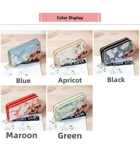 Detailed view of long double zipper floral wallets in five assorted vibrant colors