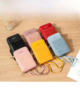 Macro view of multi-color PU leather phone bags with embossed stone texture and dual zippers