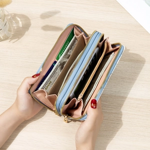 Light blue double zipper long wallet with large capacity compartments for phone and cards