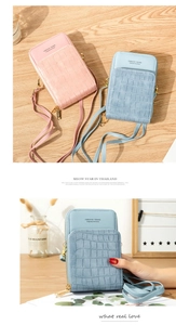 Detail of stone textured crossbody phone bags in pink and blue with metal zippers