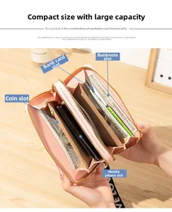 Detail view of pink long wallet showing multi-card slots and double zipper phone pocket