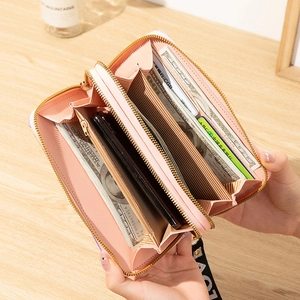 Pink double zipper long wallet for women with smartphone compartment and wrist strap