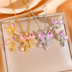 Set di gioielli eleganti con collane a fiocco di cristallo rosa e orecchini a stella nappa