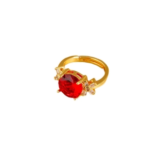 Adjustable gold ring with large red ruby and white zircon side stones on white background