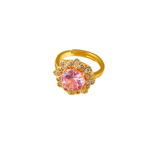 Adjustable gold flower ring with pink round gemstone and sparkling micro-pave crystals