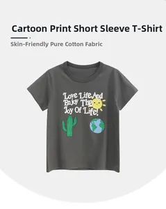 Detail of skin-friendly cotton T-shirt featuring sun and cactus cartoon prints