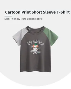 Detail of soft cotton raglan t-shirt with cartoon bear and TRAVELS print for kids