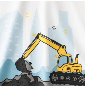 Close-up of a yellow cartoon excavator print on white cotton boy's t-shirt fabric